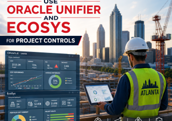 Atlanta contractors reviewing project controls data in Oracle Unifier and EcoSys software on a dashboard