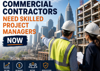 Project managers reviewing plans at an Atlanta commercial construction site with the skyline in the background